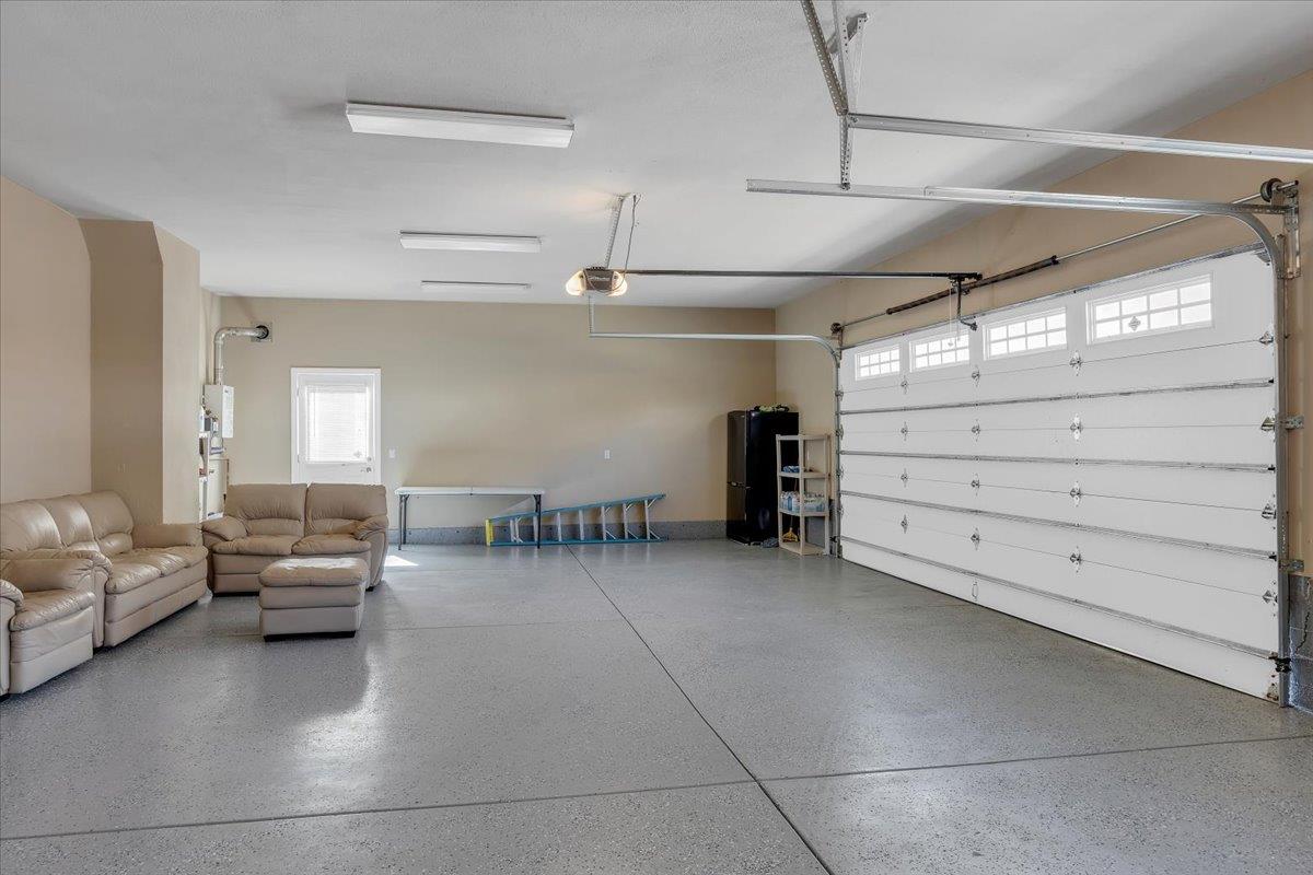 294 Sunrise Road, Unit 2 Copperopolis, CA 95228 - Photo 48 of 98 Huge epoxy-floored garage can also make a great hang area.