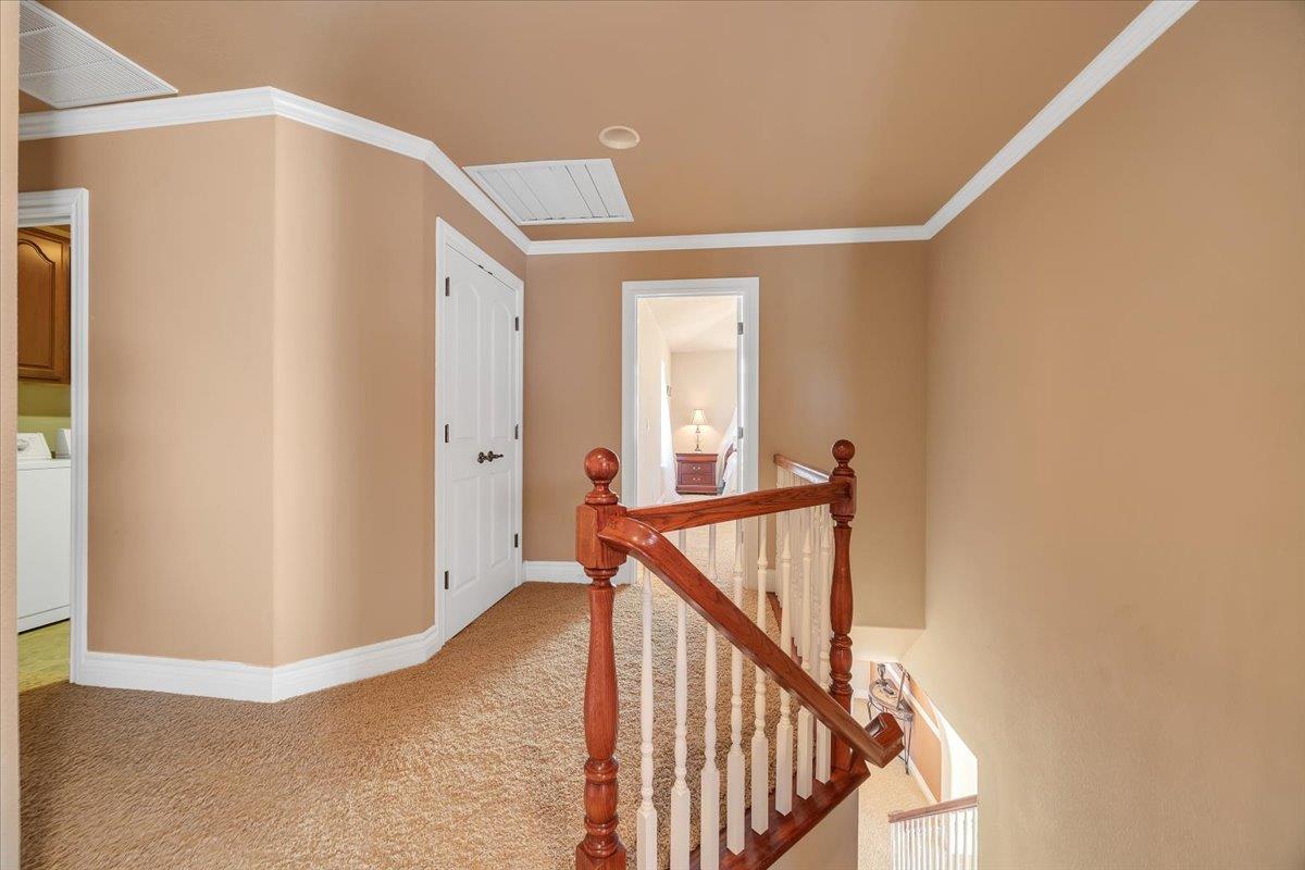 294 Sunrise Road, Unit 2 Copperopolis, CA 95228 - Photo 51 of 98 a view of a hallway with staircase