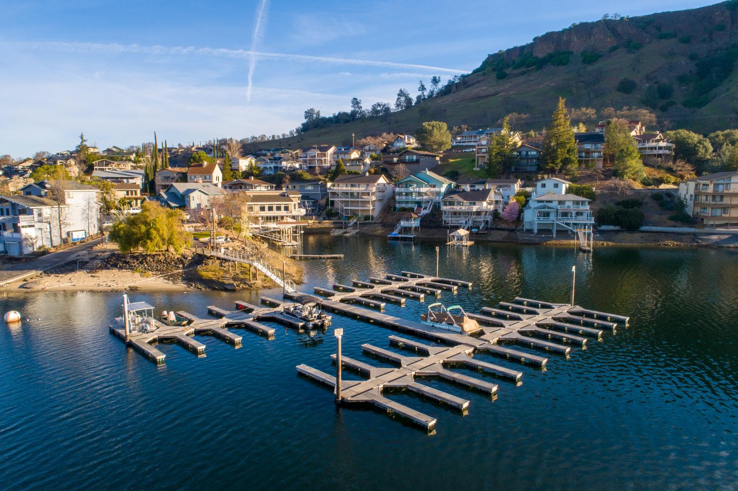294 Sunrise Road, Unit 2 Copperopolis, CA 95228 - Photo 93 of 98 an aerial view of residential houses with outdoor space and lake view