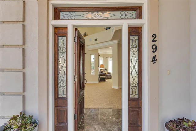 a view of an entryway with a livingroom