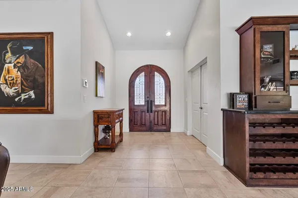 a view of an entryway with a workspace