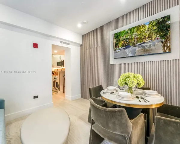 a view of a dining room with furniture window and outside view