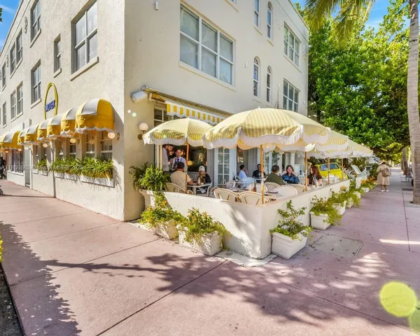 a view of a building with sitting area