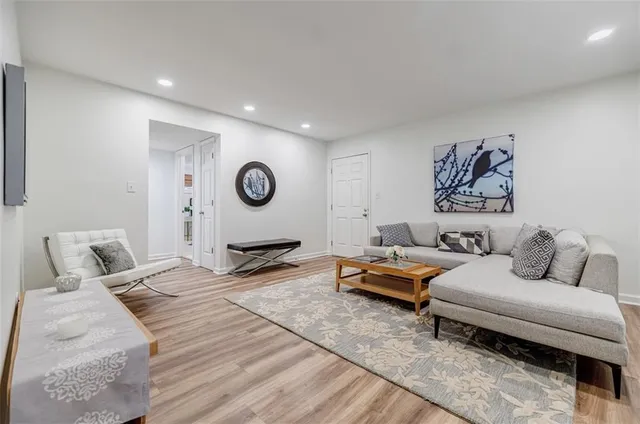 a bedroom with a bed and glass window