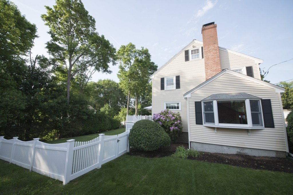 16 Latin Road Boston, MA 02132 - Photo 23 of 26 a front view of a house with a yard