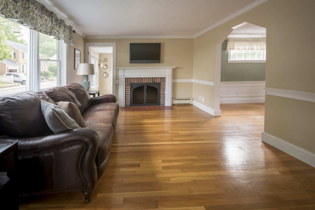 16 Latin Road Boston, MA 02132 - Photo 3 of 26 a living room with furniture and a fireplace