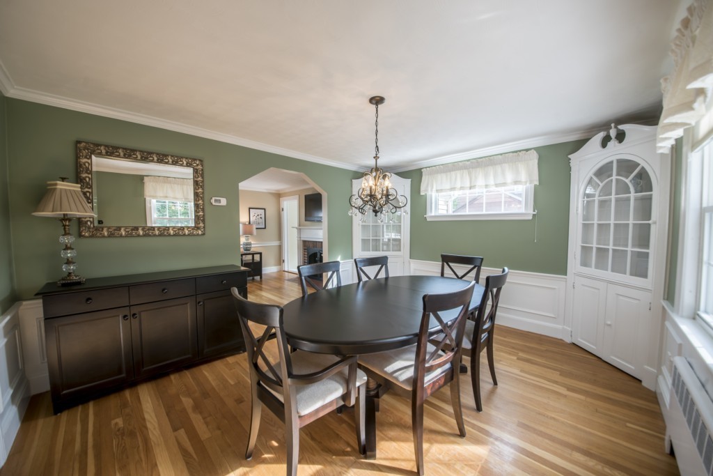 16 Latin Road Boston, MA 02132 - Photo 9 of 26 a view of a dining room with furniture window and wooden floor
