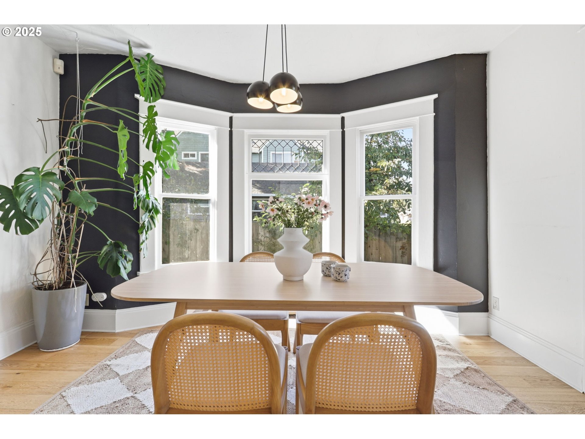954 Northeast Emerson Street Portland, OR 97211 - Photo 12 of 47 a view of a dining room with furniture and window