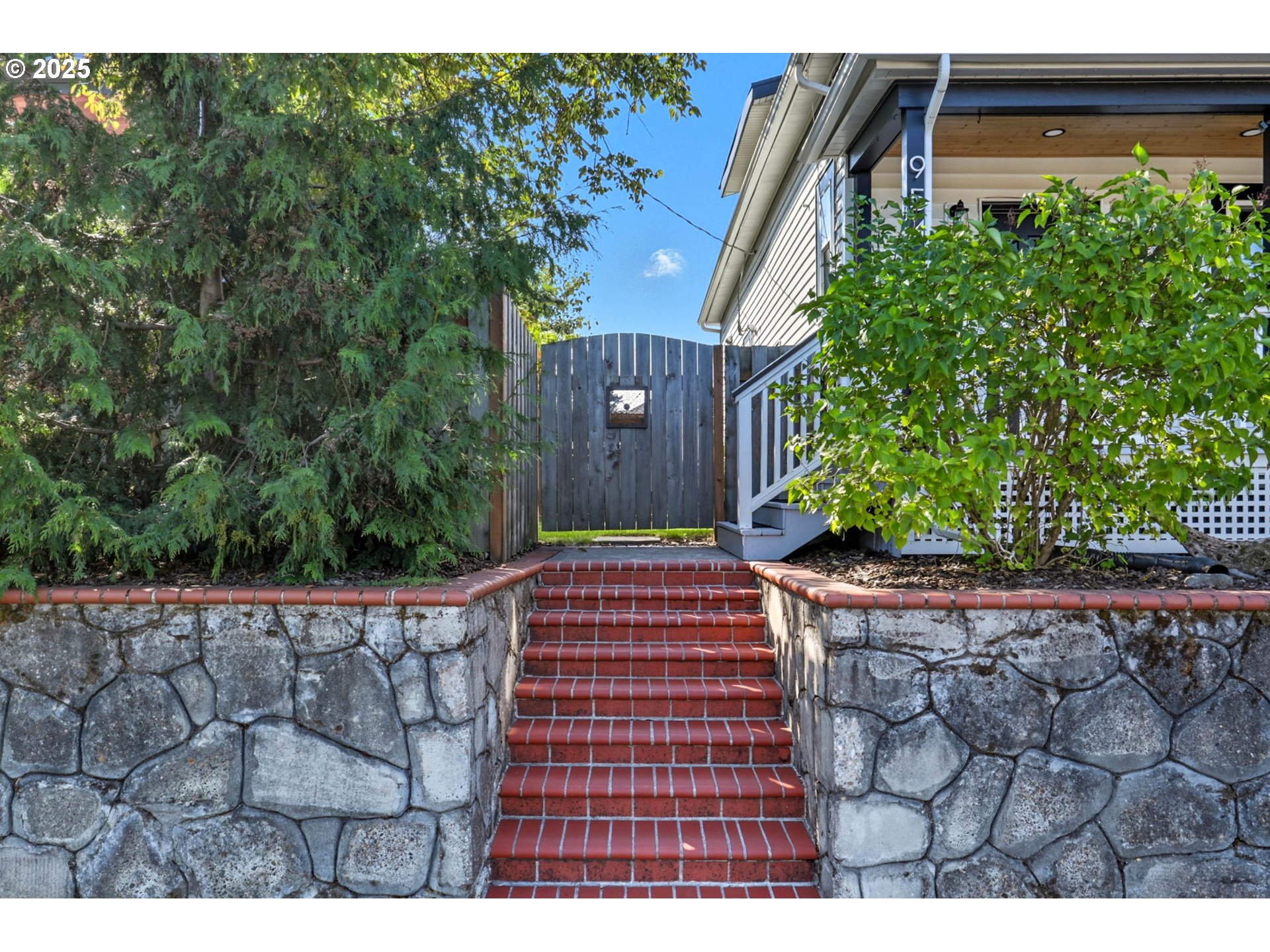 954 Northeast Emerson Street Portland, OR 97211 - Photo 2 of 47 a view of a backyard