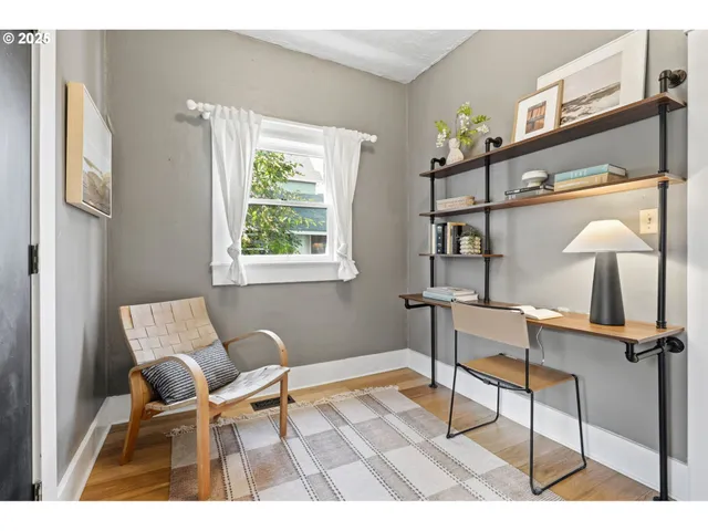 a room with gym equipment and a window