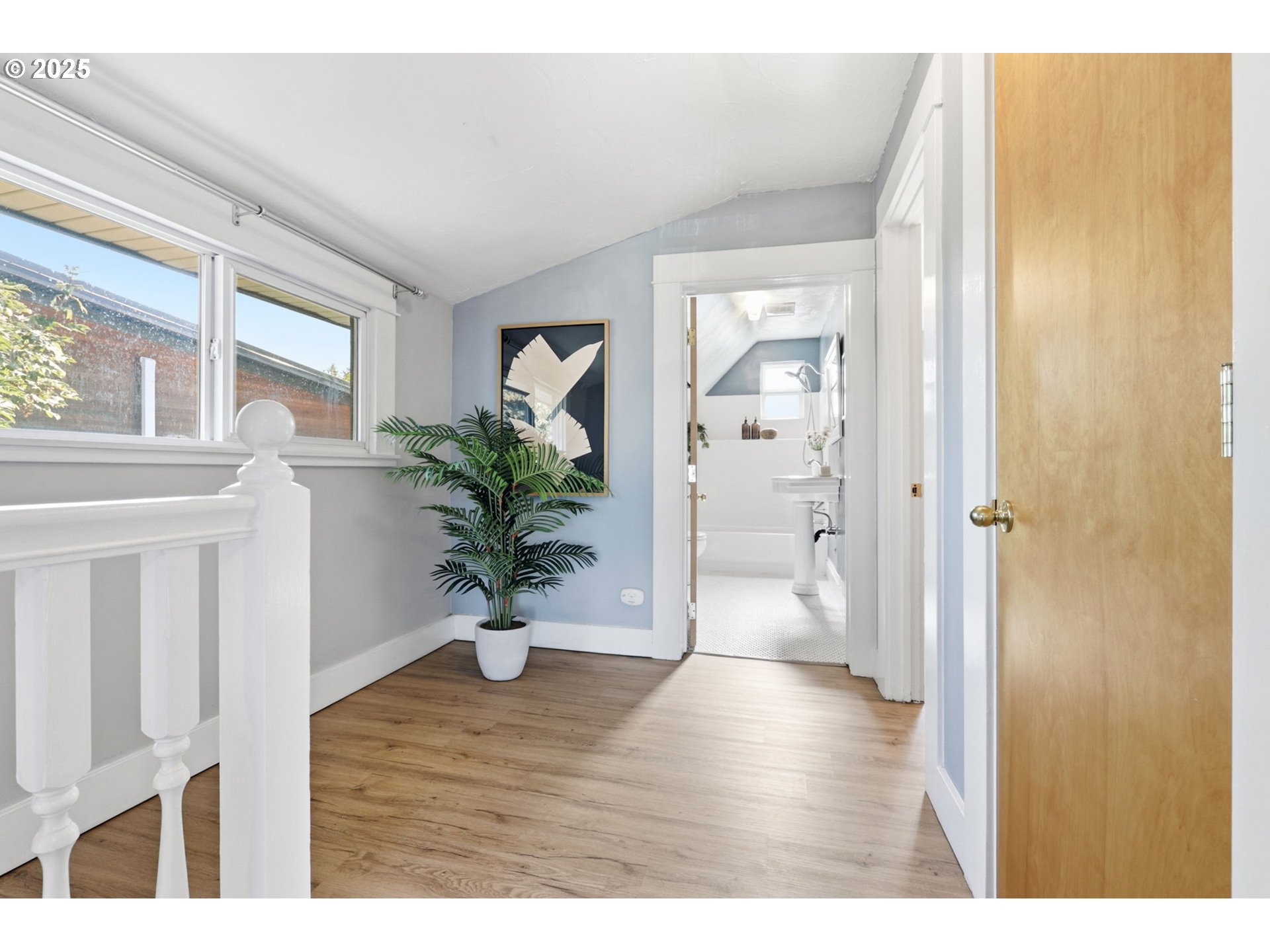 954 Northeast Emerson Street Portland, OR 97211 - Photo 33 of 47 a view of entryway with wooden floor