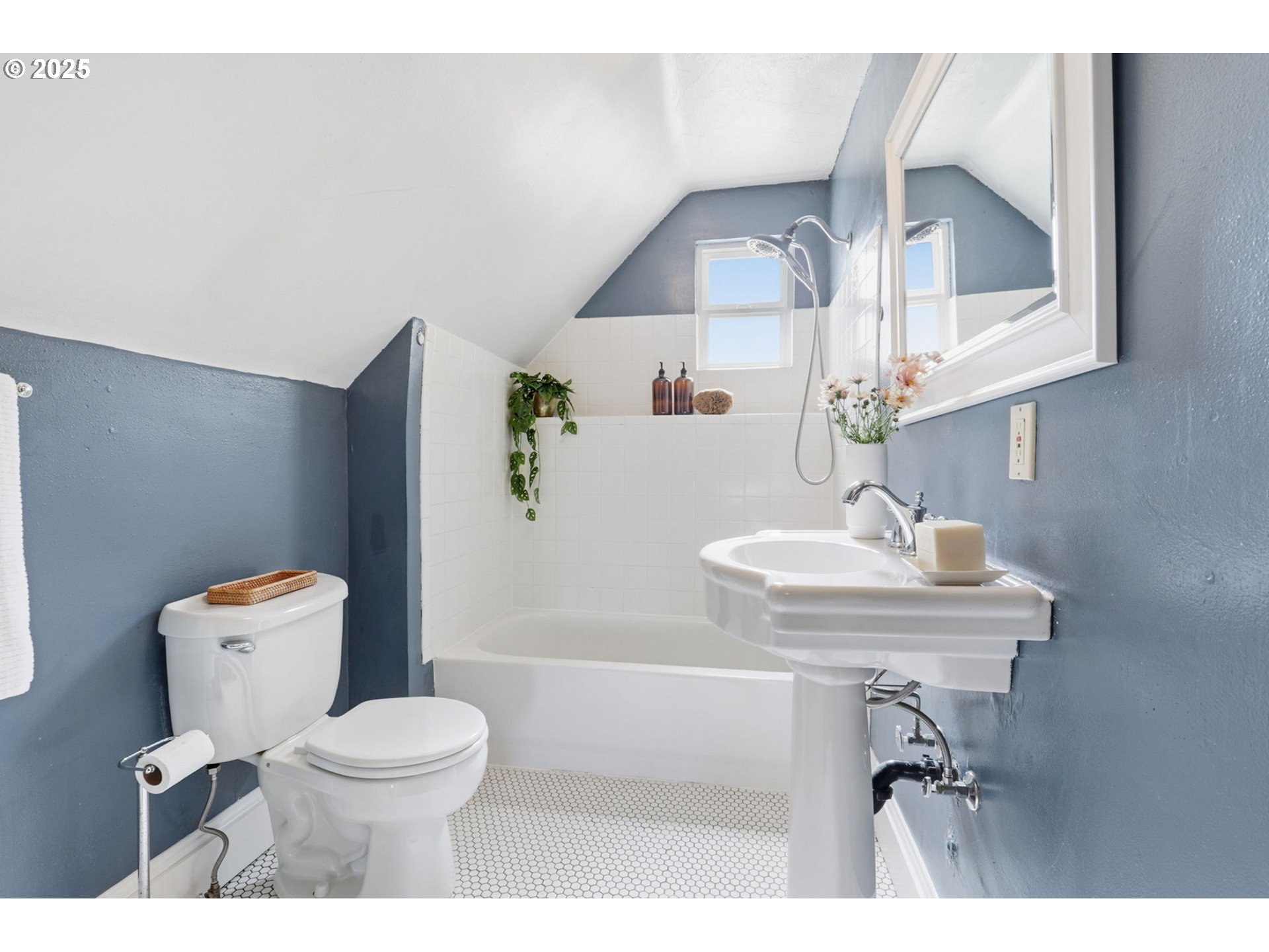 954 Northeast Emerson Street Portland, OR 97211 - Photo 35 of 47 a bathroom with a sink toilet and a mirror