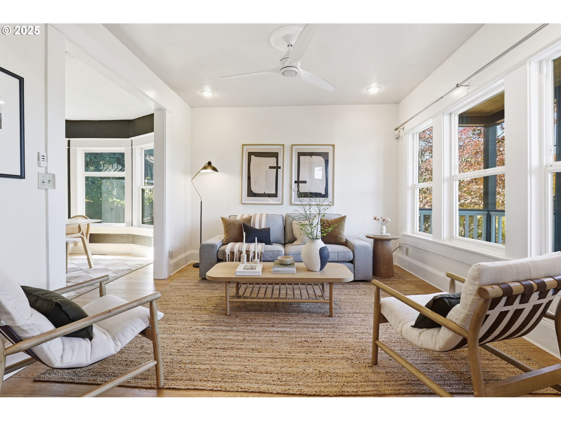 954 Northeast Emerson Street Portland, OR 97211 - Photo 6 of 47 a living room with furniture and a large window