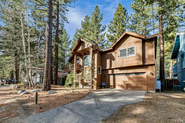 a view of a house with a street