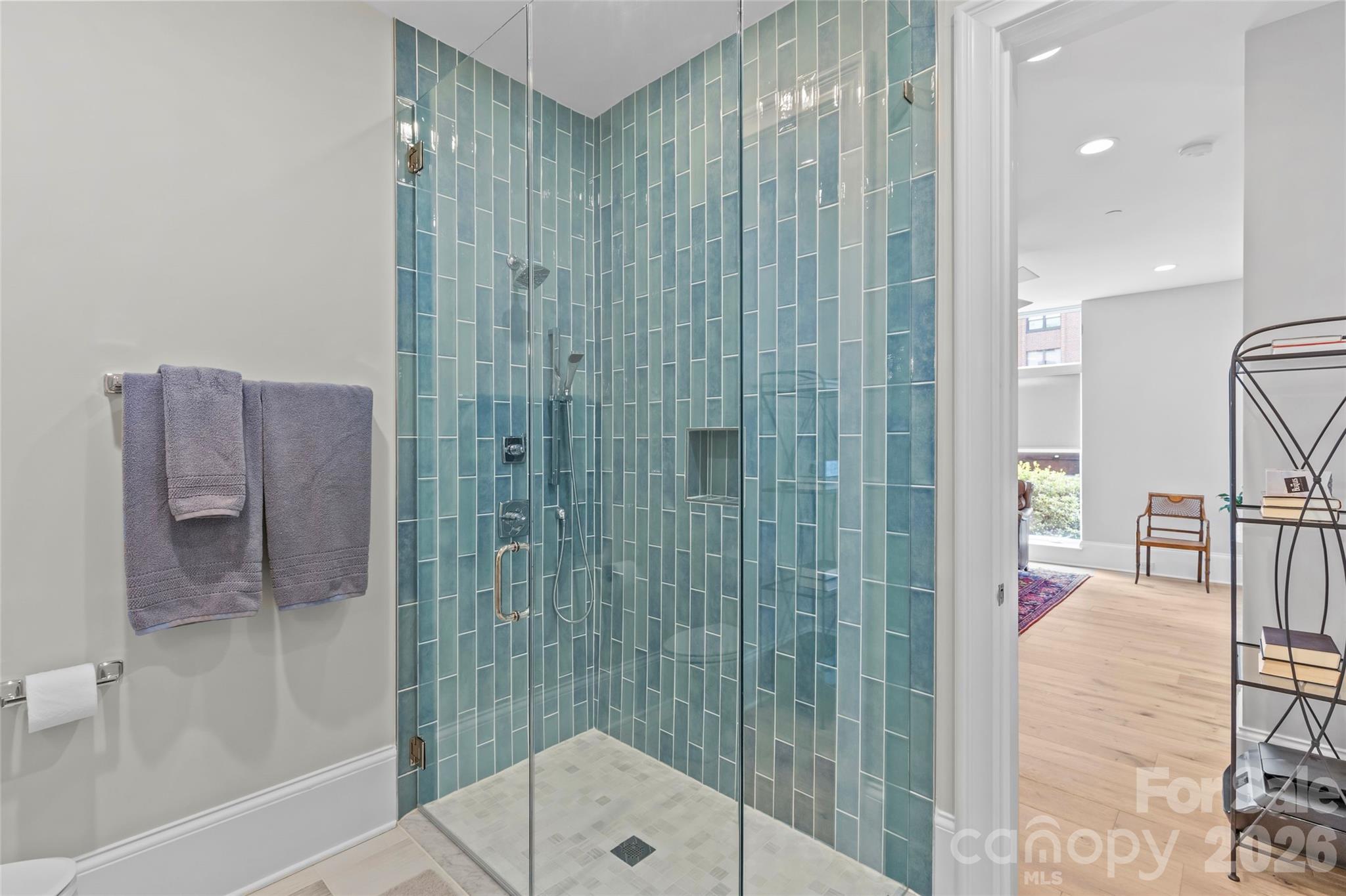 1500 Queens Road, Unit 104 Charlotte, NC 28207 - Photo 14 of 41 a bathroom with a shower and a sink