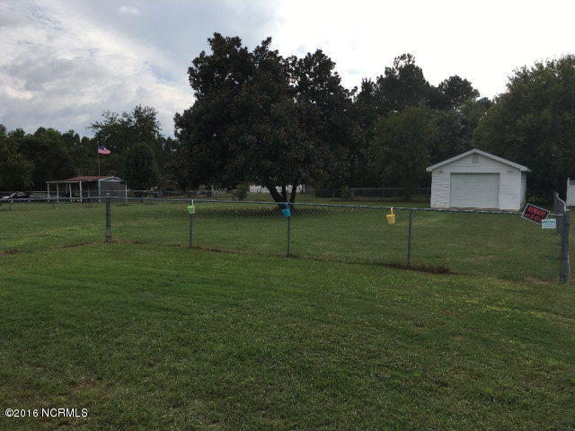 809 Mill Branch Road Rocky Mount, NC 27803 - Photo 3 of 9 Large fenced back yard with garage