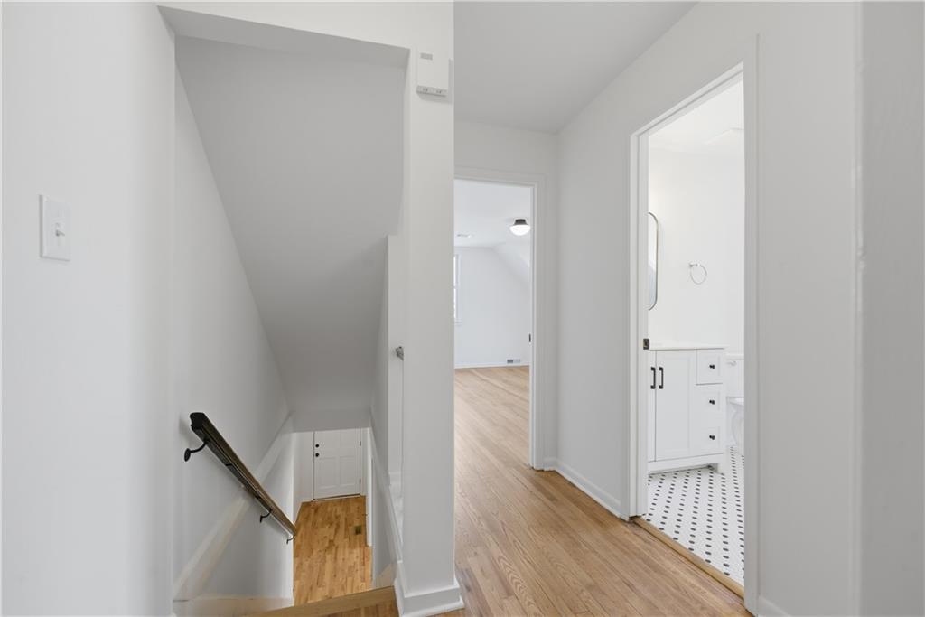 2415 Charleston Oaks Lane Decatur, GA 30030 - Photo 19 of 55 a view of a hallway with wooden floor and entryway