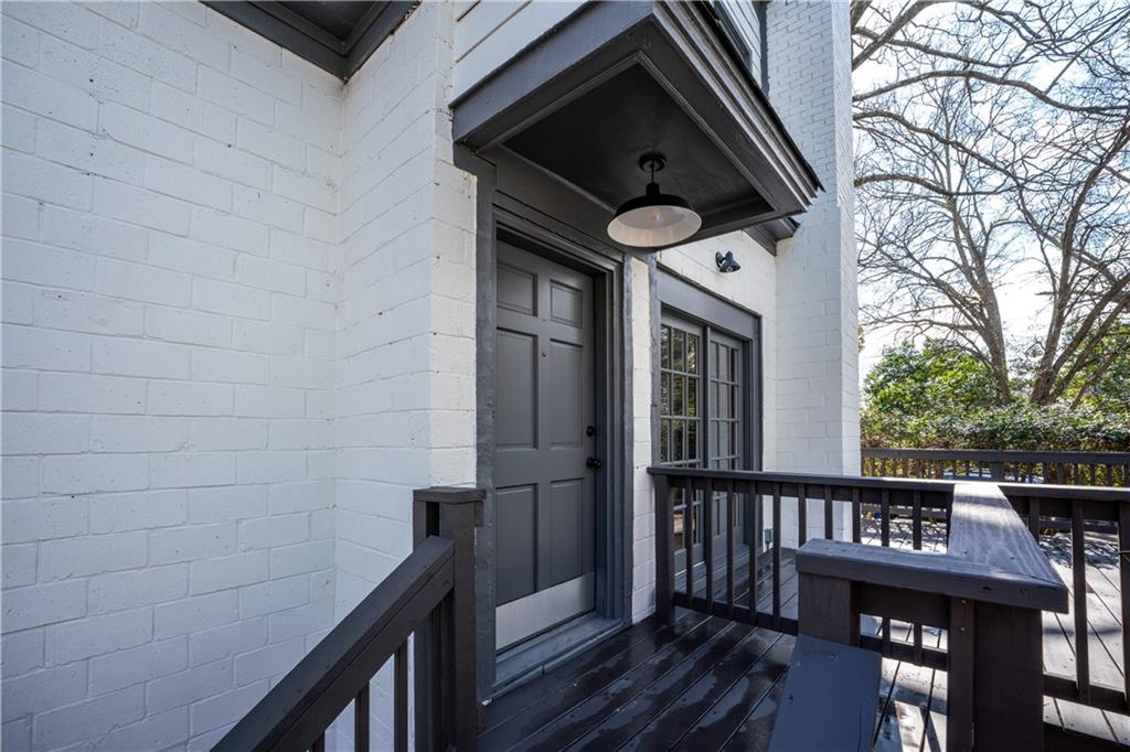 2415 Charleston Oaks Lane Decatur, GA 30030 - Photo 30 of 55 a view of a brick house with a large window