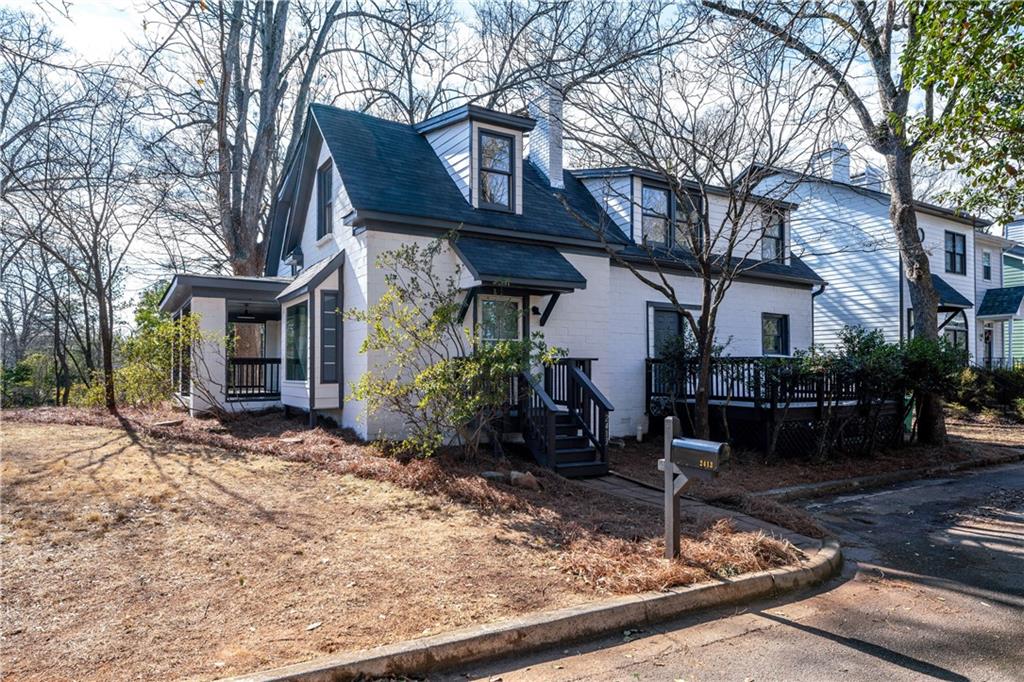 2415 Charleston Oaks Lane Decatur, GA 30030 - Photo 32 of 55 a front view of a house with garden