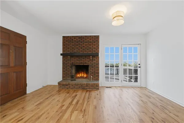 a kitchen with a sink cabinets and window