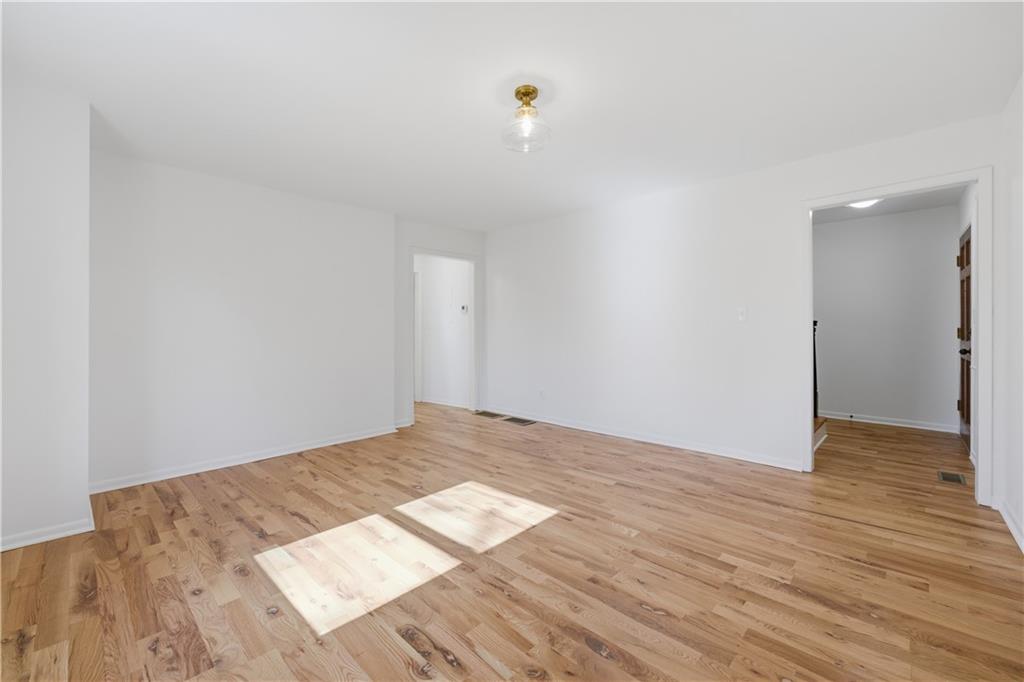 2415 Charleston Oaks Lane Decatur, GA 30030 - Photo 48 of 55 a view of an empty room and wooden floor