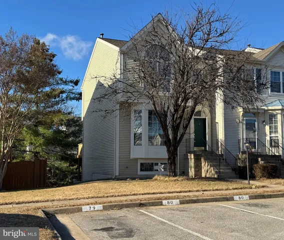 front view of a house with a trees