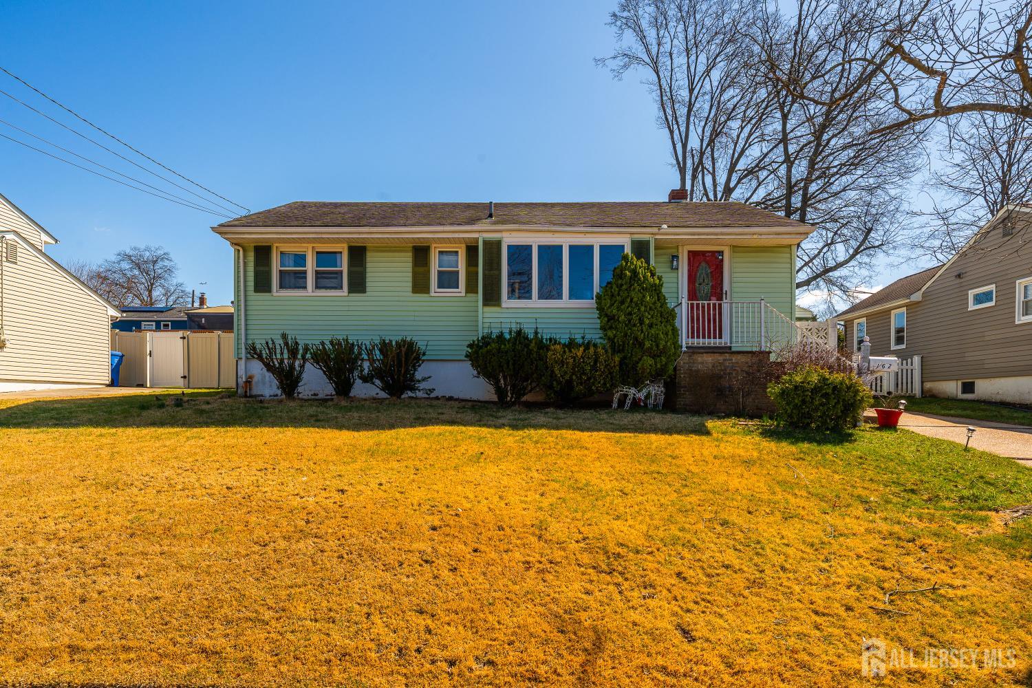 a front view of a house with swimming pool