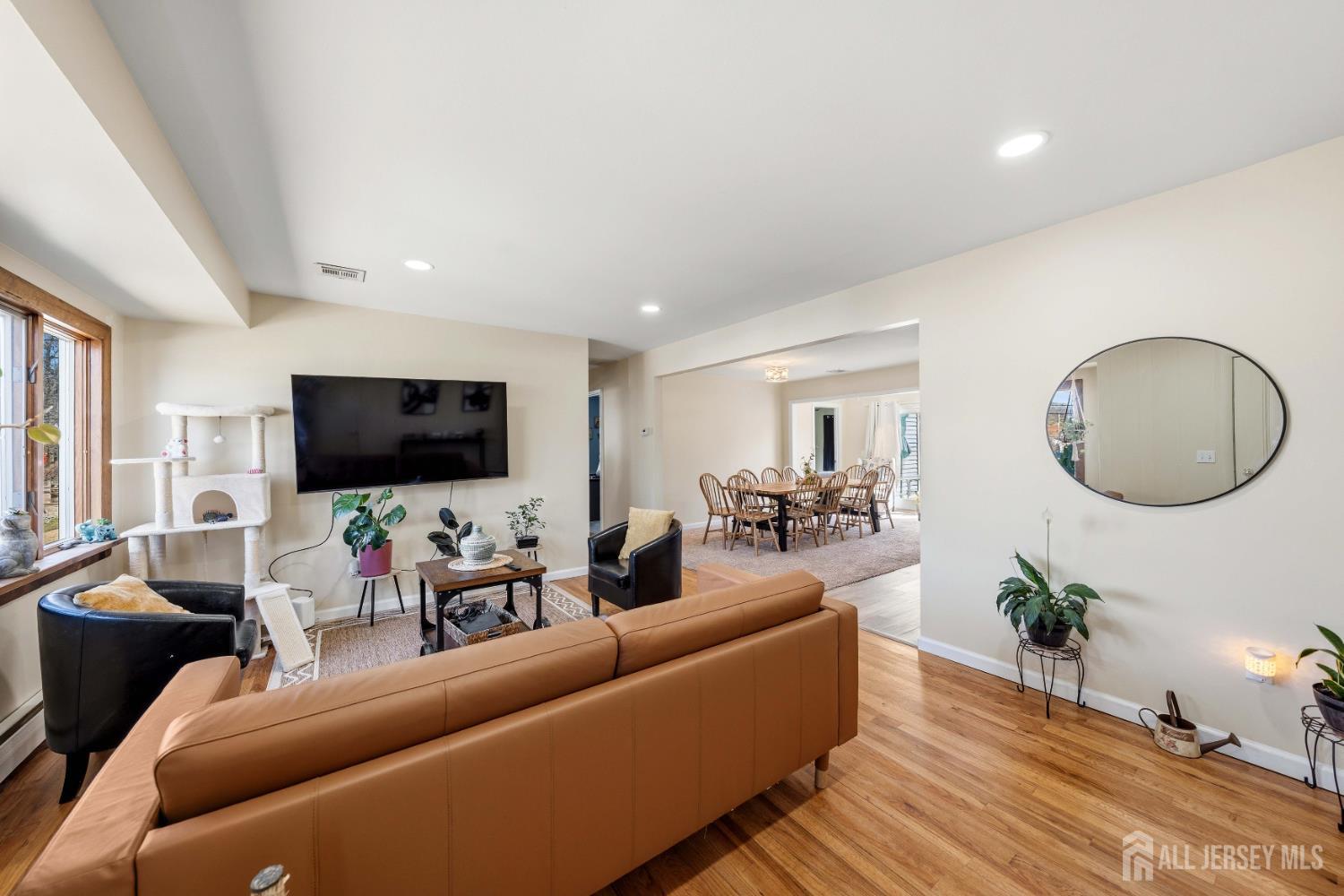 162 Rutherford Avenue Woodbridge, NJ 07095 - Photo 6 of 18 a living room with furniture and a flat screen tv