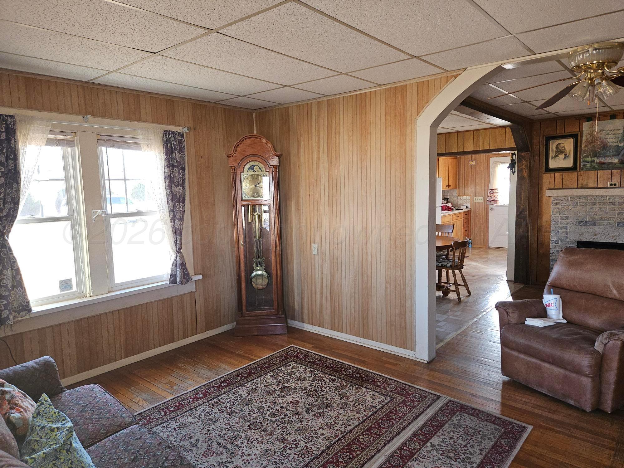 201 Oak Avenue Panhandle, TX 79068 - Photo 11 of 44 a living room with furniture and a rug