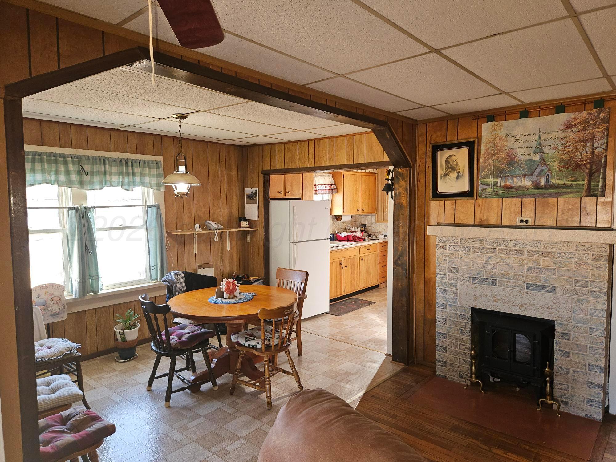 201 Oak Avenue Panhandle, TX 79068 - Photo 13 of 44 a dining room with furniture and window