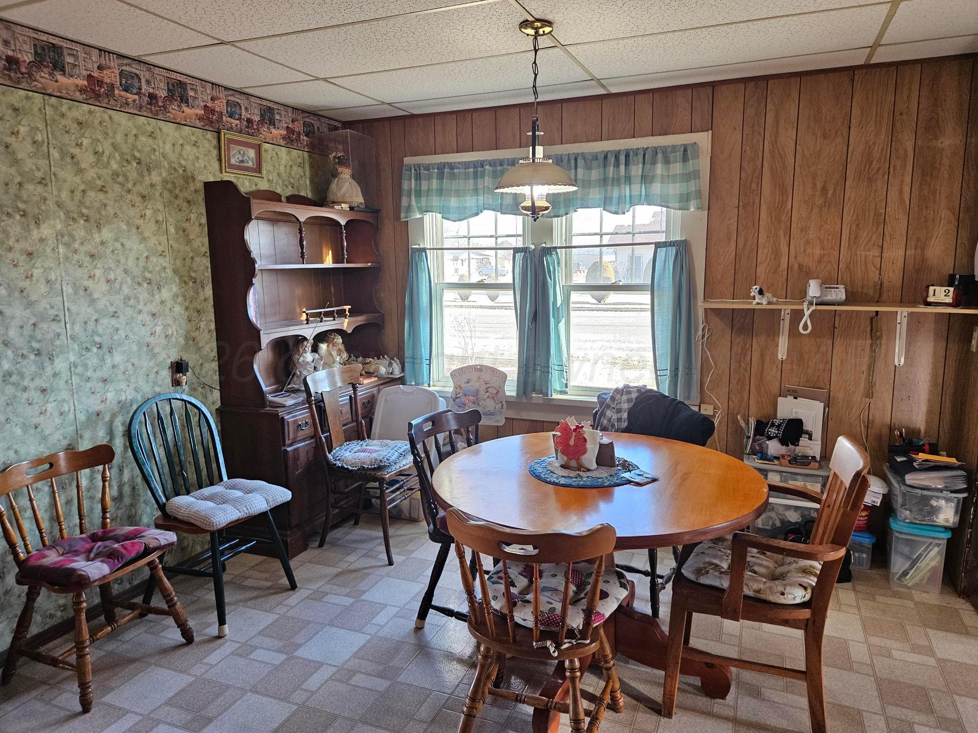 201 Oak Avenue Panhandle, TX 79068 - Photo 14 of 44 a view of a dining room with furniture window and outside view