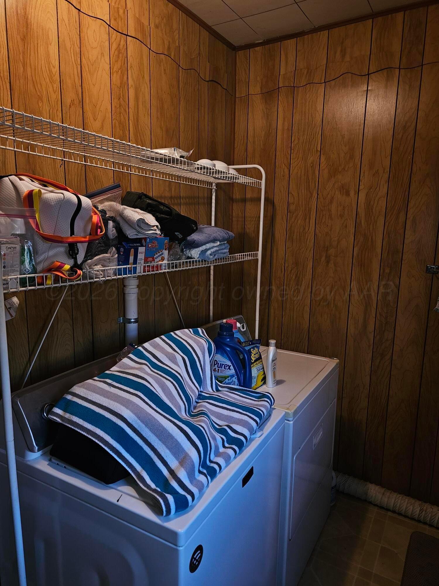 201 Oak Avenue Panhandle, TX 79068 - Photo 23 of 44 a kitchen with a sink and cabinets