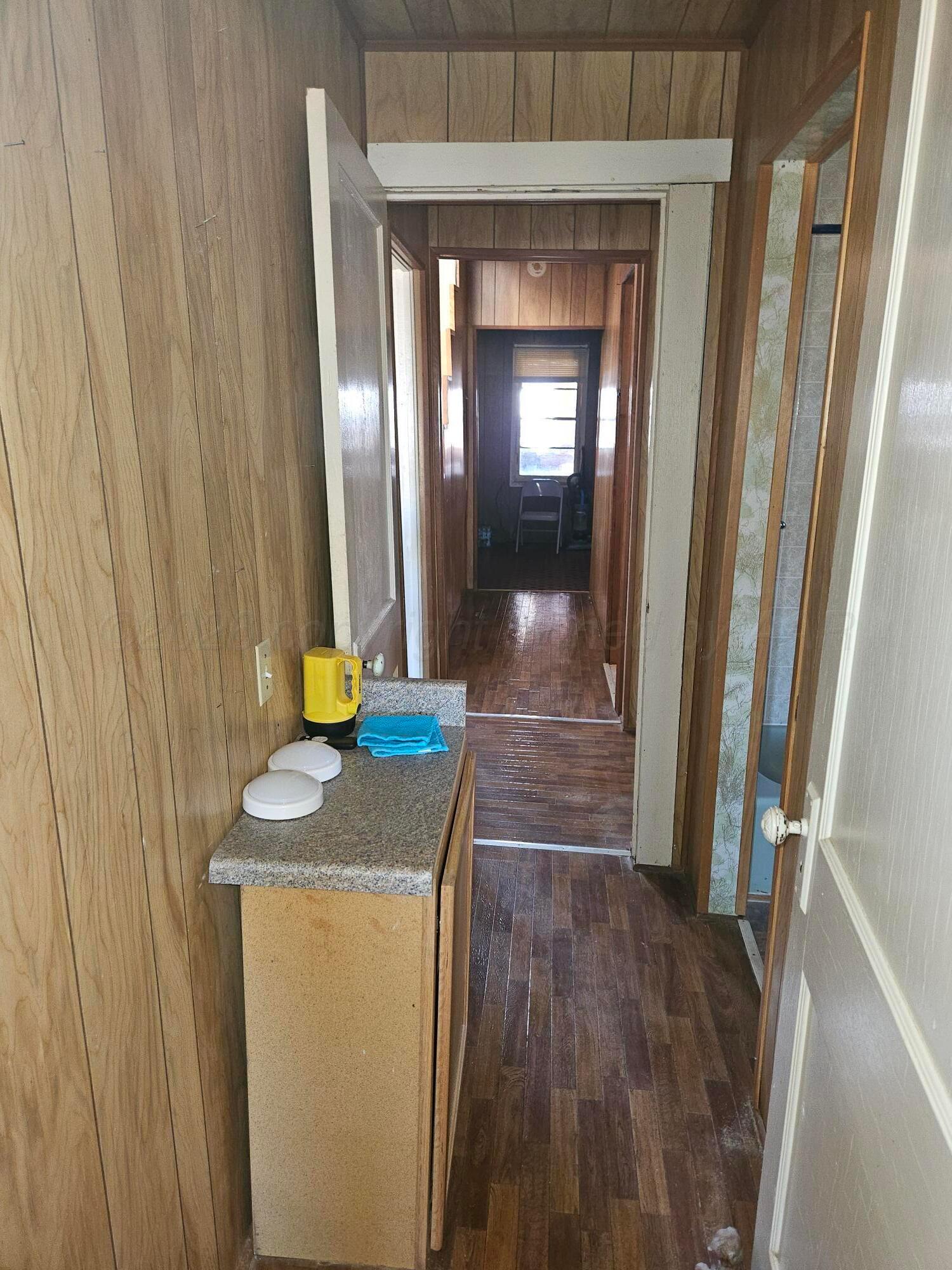 201 Oak Avenue Panhandle, TX 79068 - Photo 31 of 44 a hallway with washer and dryer
