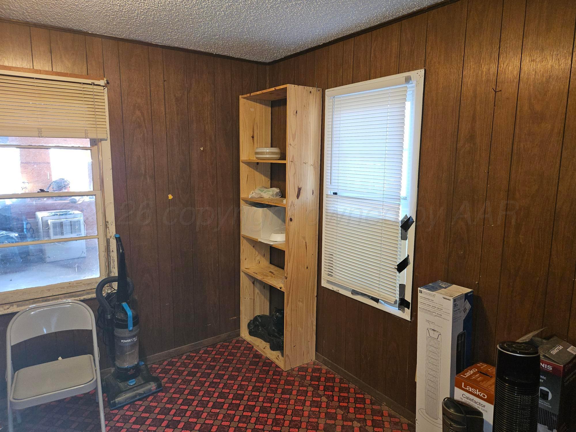 201 Oak Avenue Panhandle, TX 79068 - Photo 32 of 44 a room with door