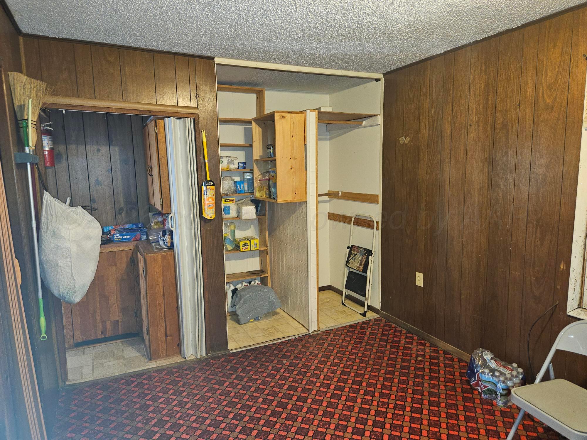 201 Oak Avenue Panhandle, TX 79068 - Photo 34 of 44 a view of a walk in closet