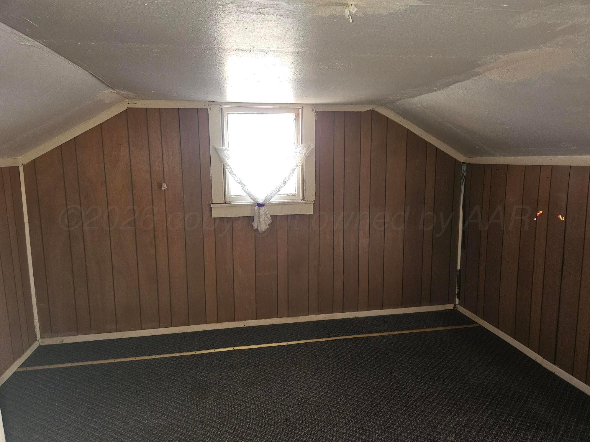 201 Oak Avenue Panhandle, TX 79068 - Photo 40 of 44 a view of empty room with wooden floor