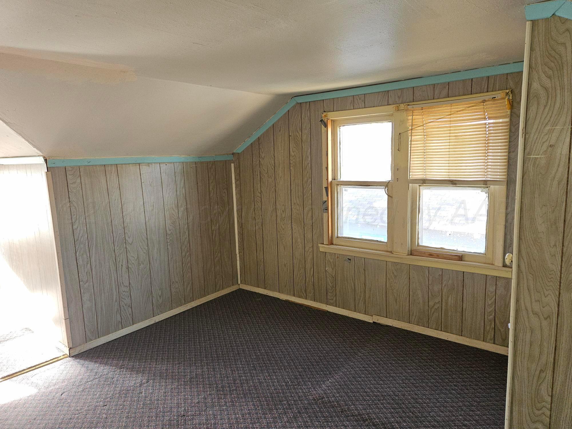 201 Oak Avenue Panhandle, TX 79068 - Photo 42 of 44 a view of an empty room with a window