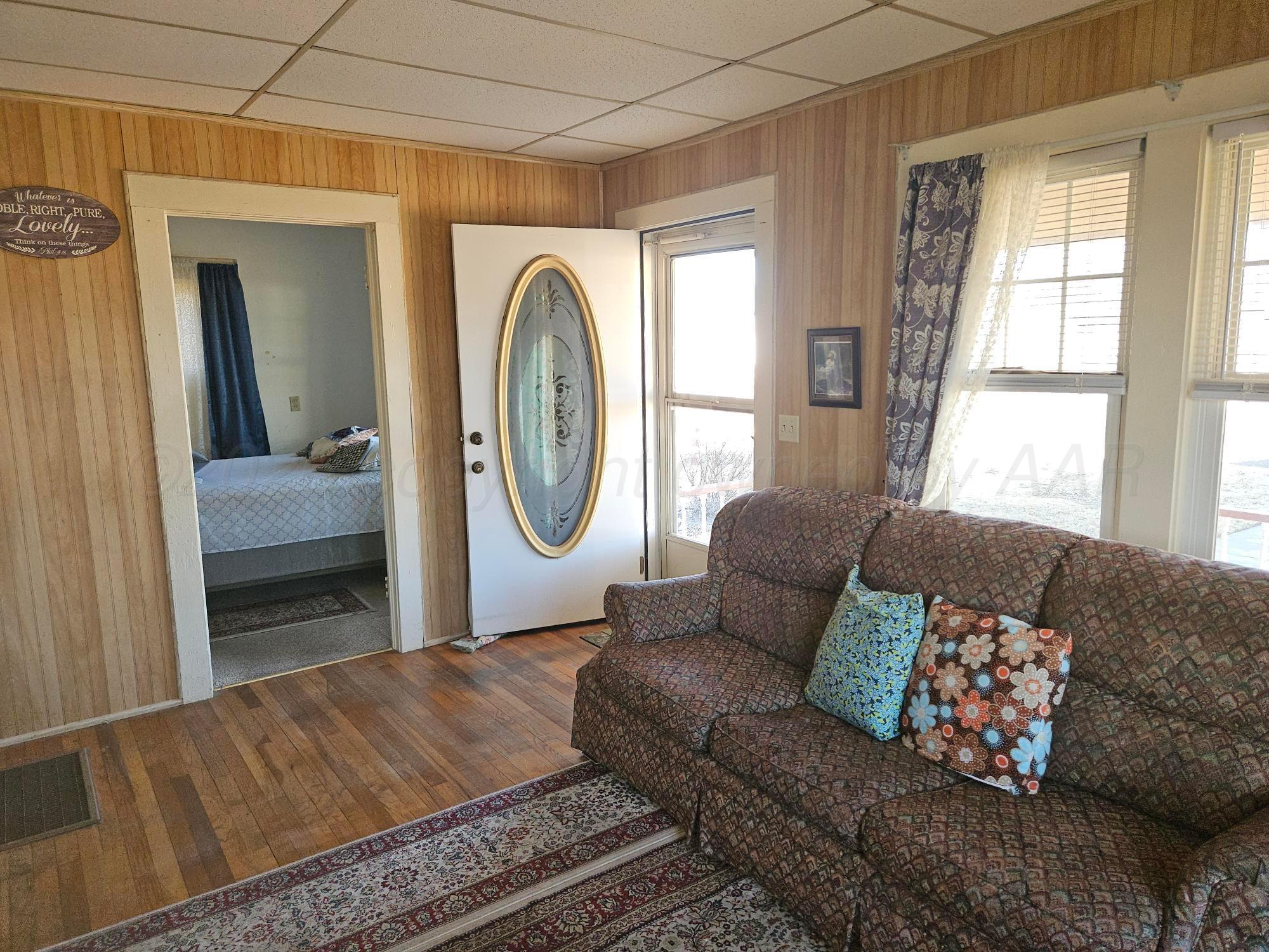 201 Oak Avenue Panhandle, TX 79068 - Photo 9 of 44 a living room with furniture and a window