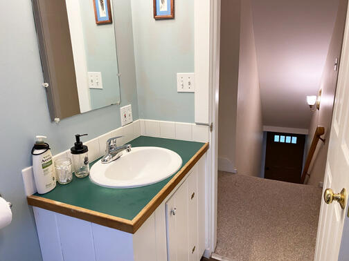 5 Sandalwood Road Belfast, ME 04915 - Photo 14 of 20 5 Sandalwood Bathroom Up to Stairs Down