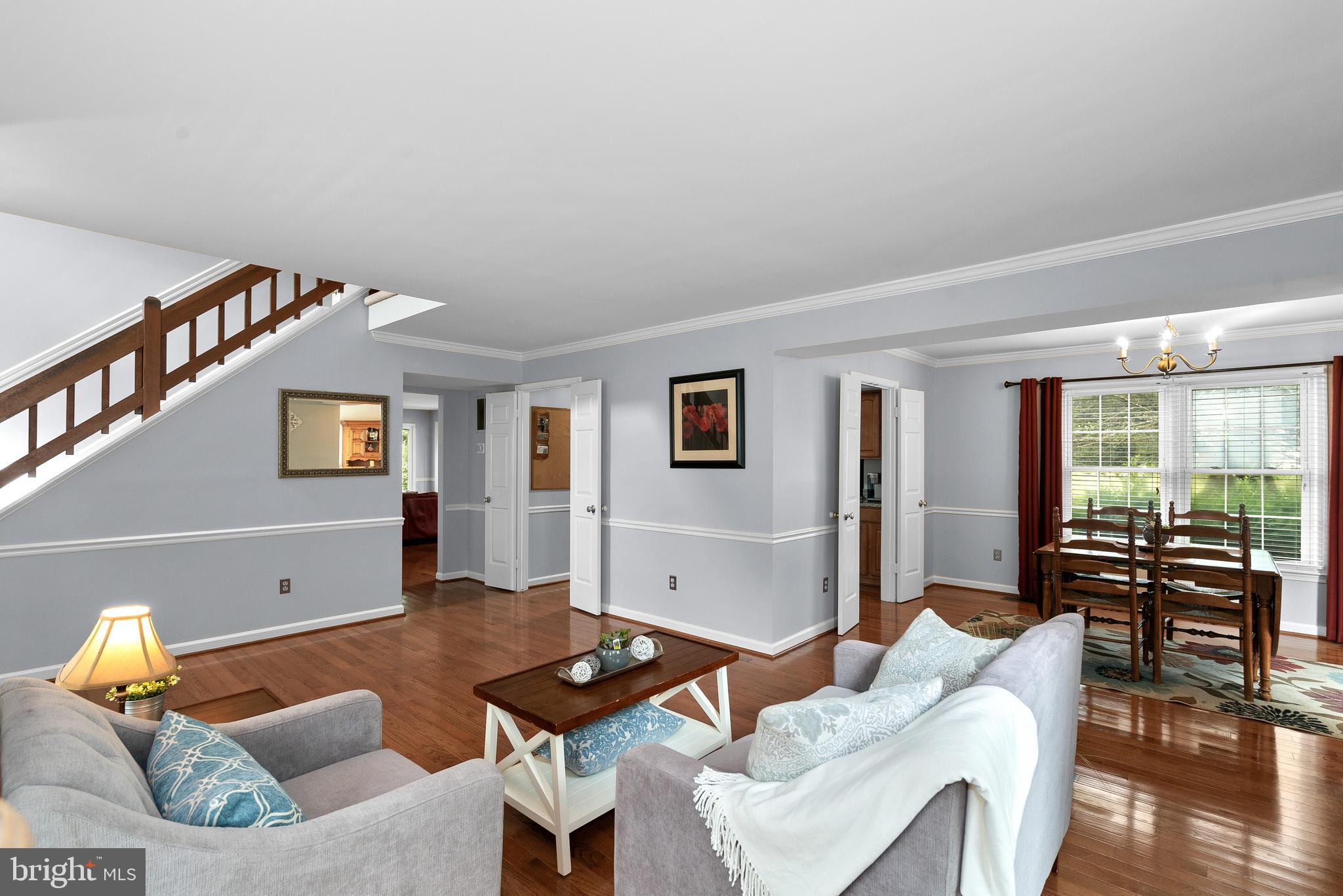13910 Poplar Tree Road Chantilly, VA 20151 - Photo 7 of 51 Main Level Living Room Opens to Dining Room