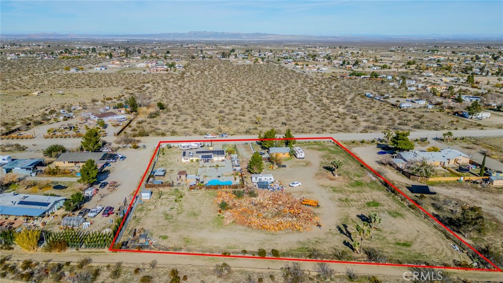 4637 Luna Road Phelan, CA 92371 - Photo 35 of 43 an aerial view of residential houses with outdoor space