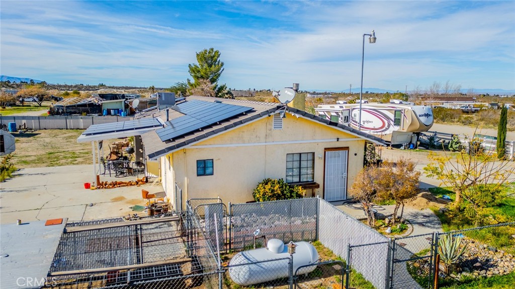 4637 Luna Road Phelan, CA 92371 - Photo 42 of 43 a view of a terrace with chairs