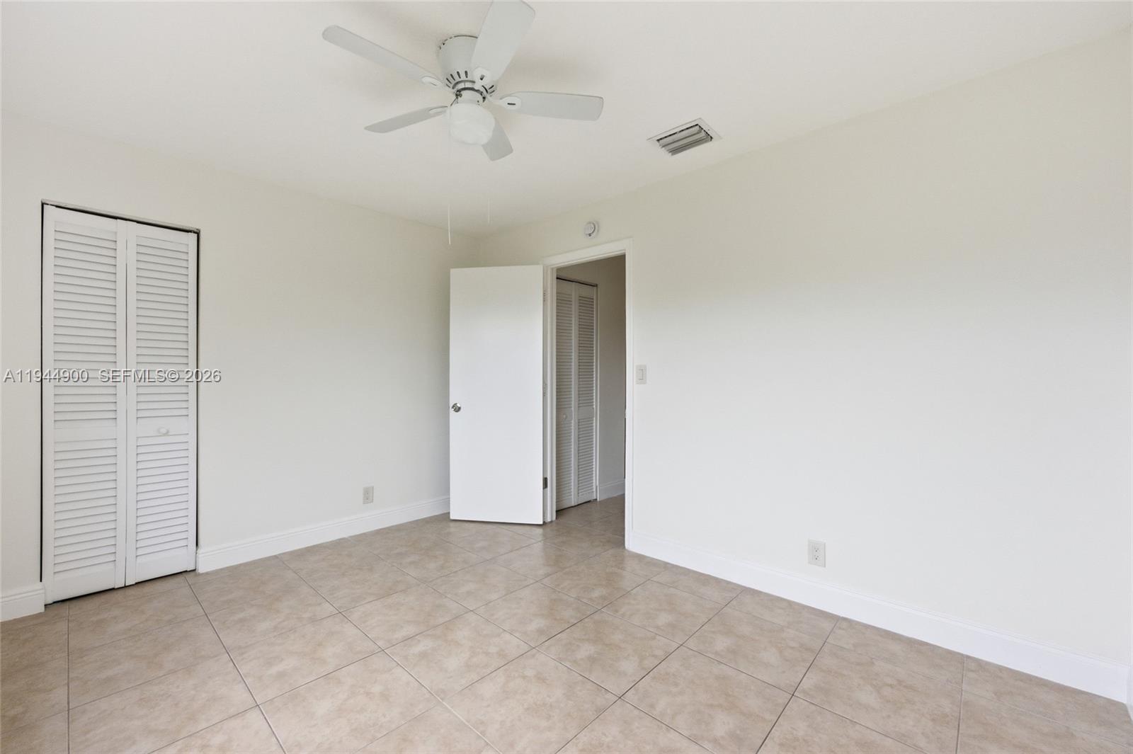 3003 Northwest 5th Terrace, Unit 2 Pompano Beach, FL 33064 - Photo 23 of 28 a view of an empty room