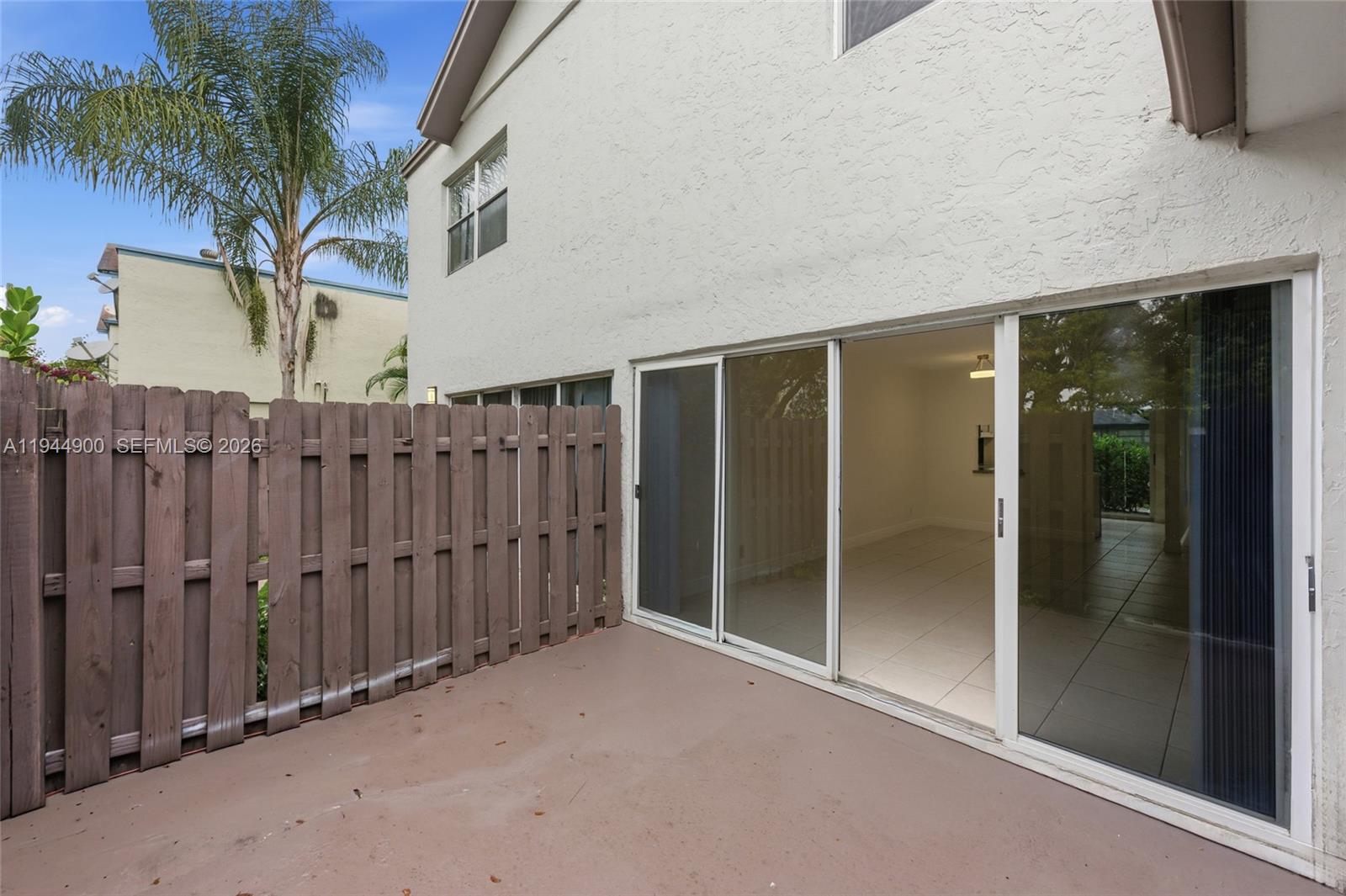 3003 Northwest 5th Terrace, Unit 2 Pompano Beach, FL 33064 - Photo 24 of 28 a view of an entryway with wooden floor