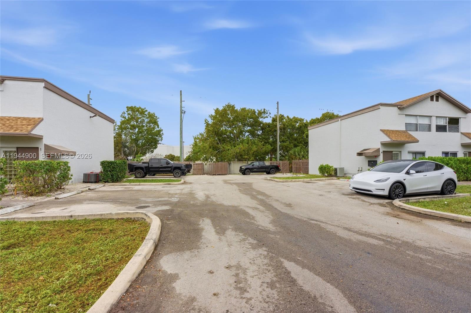 3003 Northwest 5th Terrace, Unit 2 Pompano Beach, FL 33064 - Photo 28 of 28 a view of a street with houses