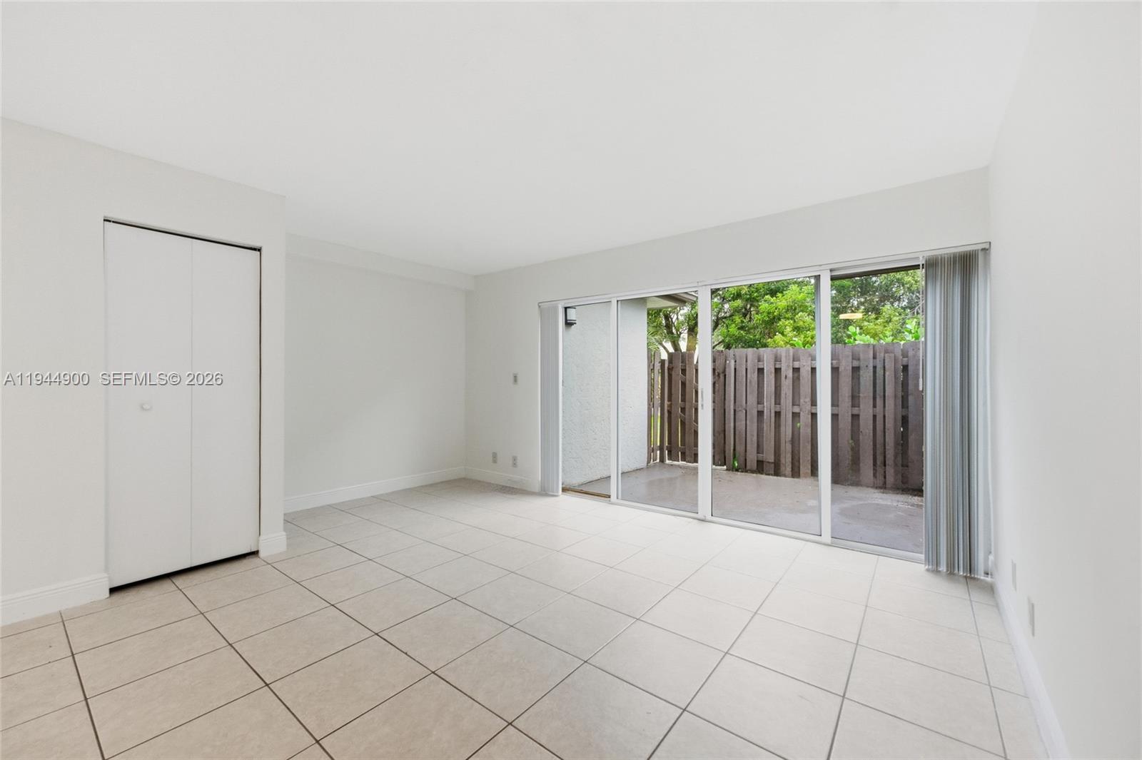 3003 Northwest 5th Terrace, Unit 2 Pompano Beach, FL 33064 - Photo 10 of 28 an empty room with windows