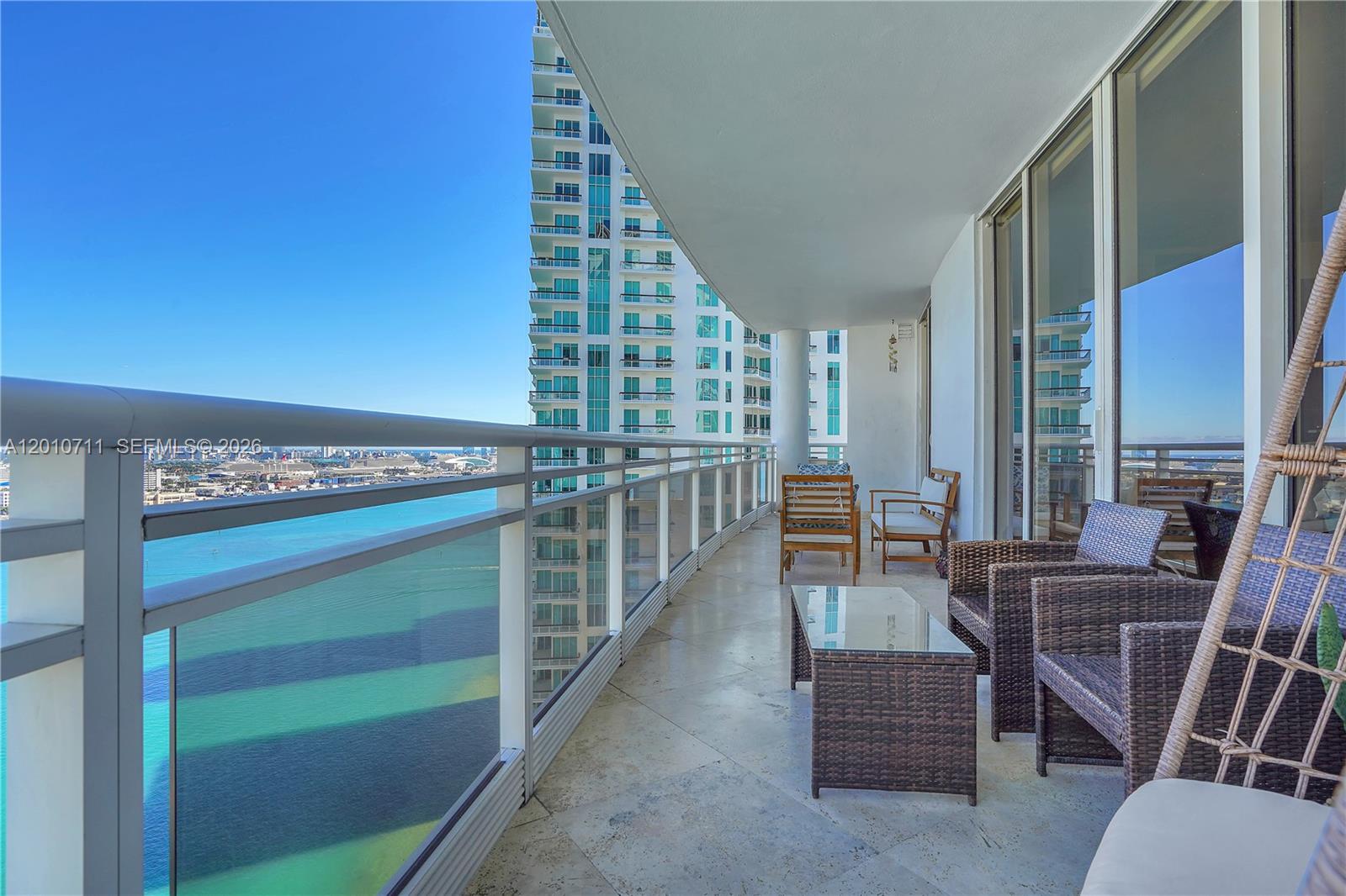 901 Brickell Key Boulevard, Unit 2807 Miami, FL 33131 - Photo 2 of 29 a view of livingroom with furniture