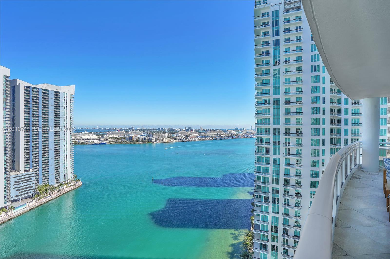 901 Brickell Key Boulevard, Unit 2807 Miami, FL 33131 - Photo 3 of 29 a view of a balcony with ocean view