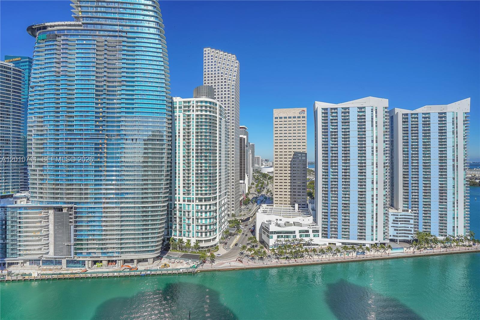 901 Brickell Key Boulevard, Unit 2807 Miami, FL 33131 - Photo 6 of 29 a front view of a building with lake view