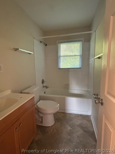 1070 Rulnick Street Fayetteville, NC 28304 - Photo 10 of 15 a bathroom with a granite countertop toilet a sink and bathtub